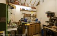 The interior, with lathe, bandsaw, etc.