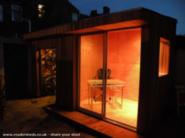 Wood gives a lovely warm glow at night