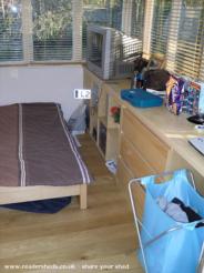 Shelving, draws and desk area