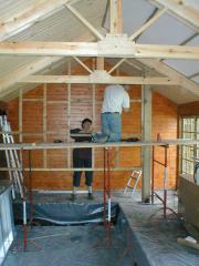 The stud wall goes up