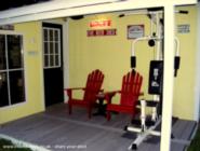 dog pen now covered porch of shed - the enchanted shed, 