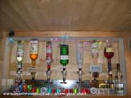 Behind the bar of shed - BAR HUMBUG AND HOME BREWERY, 