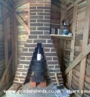 Pot-bellied stove and hearth of shed - The Plot Thickens, Berkshire