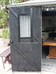 Tigh Na Ceiteach: Ther Old Oak door, Styrofoam, paint and the heads of railway pins 