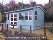 blue wooden workshop of shed - wooden workshops, 