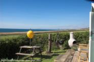 View from shed westwards along Chesil Bank to Golden Cap, Lyme Regis and beyond. of shed - Chesil View, 