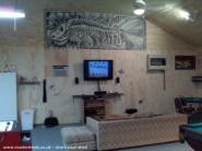 The Manshed: 42" high def below awesome mural