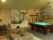 The Manshed: 1908 Brunswick/Balke/Collander pool table. The mural behind is 27' wide!