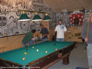 Pool game in progress and view of the big mural. of shed - The Manshed, 