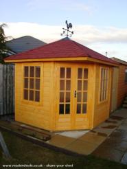 Our new arrival - Quinny, our five sided summer house c/w cock on top of shed - The WOODEN WEDGY, Angus