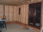 Insulation goes in and windows and french doors of shed - , 