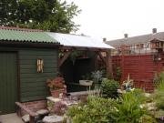 HAPPY SMOKER ,: side view -summer house