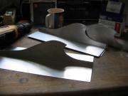Head Weeders Office: Making up the ridge tiles - a groovy wave type design.