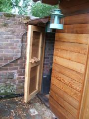 'Shed and Son of Shed': Son of Shed shows off his natty latch-cum-toilet-roll-holder