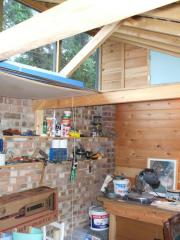 'Shed and Son of Shed': wooden cladding wooden shingles wooden beams inside
