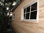 two side windows of shed - cottage in the woods, 