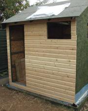Cladding goes on of shed - Das Bunker, 