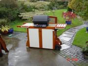 Home made BBQ from scrap wood and wheels from car boot of shed - Alien sanctuary., Cheshire West and Chester