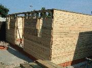 Log effect cladding.....goes on nice and easy tho'. of shed - , 