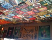 ceiling with bar mats from around the world of shed - LiLi's Bar, 