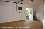 Studio Portraits: From the back looking forward towards the door