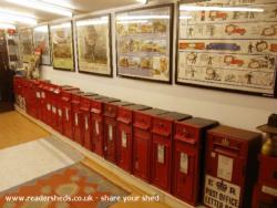 The main Victorian post box display, there are 22 boxes in the line of shed - Colne Valley Postal History Museum, Essex