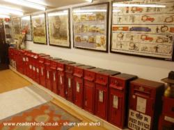 Colne Valley Postal History Museum: The main Victorian post box display, there are 22 boxes in the line