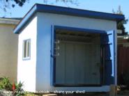 Front with both doors open of shed - little blue spunky shed, 
