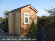 Doors on of shed - Wind Powered Shower Shed, 