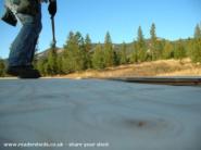 Nailing the loft deck of shed - The Yonderosa Mini-Delux, 