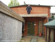 SON ON BALCONY of shed - KENS CLASSIC CABIN, 