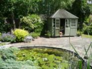 everything is blooming of shed - My Mombasa inspired Pondhouse, West Midlands