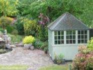 in full bloom of shed - My Mombasa inspired Pondhouse, West Midlands