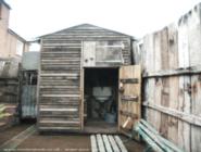 upper door shut of shed - The Net Hut Shed, East Sussex