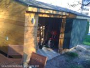 Sliding door open- get the bikes out of shed - Margaret's tea shed , 