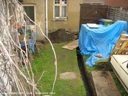 Lots of digging! (lovely in the rain) of shed - The Shedifice, 