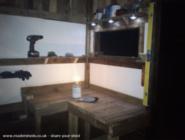 Hidey Hole: Work bench, note ceiling tiles as insulation.