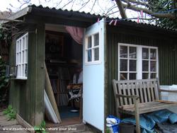 Exterior view, door open of shed - The Spinshed, 