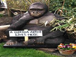 A full sized Gorilla guards the entrance to the Stencil Shed just before a small raised veg patch of shed - The Stencil Shed, Wiltshire