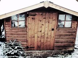Front view in snow of shed - The Brokedown Palace, Greater London