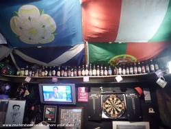 flags and collection of shed - The footy nite bunker, South Yorkshire
