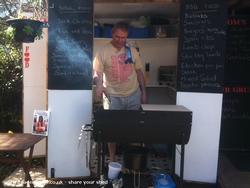 Tom cooking in the Soul Food Shack of shed - Tom's Tavern and Soul-food Shack, Cheshire East