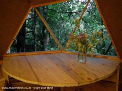 curved desk made from timber milled on site of shed - Earthen Tiny Home Dome, Oregon