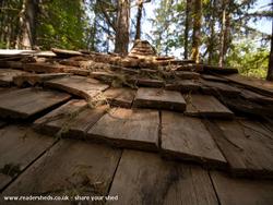 reclaimed cedar shingle roof of shed - Earthen Tiny Home Dome, Oregon