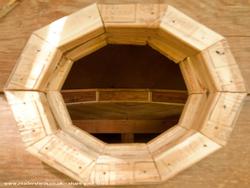 view through the porthole of shed - Earthen Tiny Home Dome, Oregon