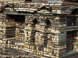 Detail: stacked boards salvaged from the garden of shed - Stack, Aberdeenshire