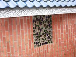Round glass blocks of shed - the Gaudi school shed, Leicestershire