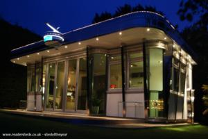 Front side view at night of shed - Starliner Diner , West Sussex