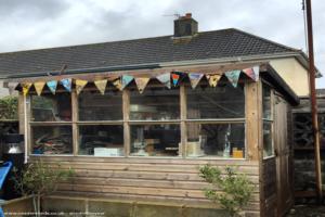 Decorate with recycled skateboard bunting of shed - Thrashion, Cornwall