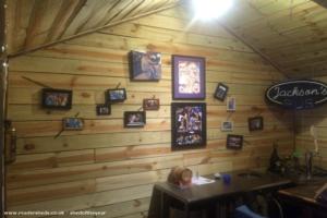 some fun party pics on the wall of shed - Jackson's Brew Pub, Oklahoma